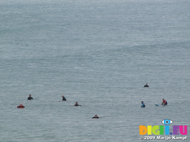 SX06997 Surfers waiting for waves at Bude